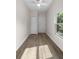 Well-lit bedroom featuring stylish wood floors, closet, and a ceiling fan for added comfort at 1931 24Th S St, St Petersburg, FL 33712