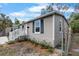 Exterior view of a cozy home featuring a tidy yard and a classic design at 1931 24Th S St, St Petersburg, FL 33712