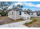 A well-kept home showcasing a neat yard, walkway, and a traditional architectural style at 1931 24Th S St, St Petersburg, FL 33712