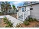 Charming home with a well-maintained front yard, landscaped walkway, and welcoming entrance at 1931 24Th S St, St Petersburg, FL 33712
