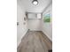 A bright laundry room with storage, utility hookups, and a window for natural light at 1931 24Th S St, St Petersburg, FL 33712