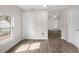 Bright, open living space with wood-look floors and neutral walls at 1931 24Th S St, St Petersburg, FL 33712