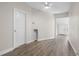 Neutral room featuring wood-look floors and a white ceiling fan at 1931 24Th S St, St Petersburg, FL 33712