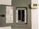 Image of breaker box and digital thermostat at 200 Country Club Dr # 503, Largo, FL 33771