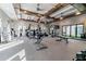 Well-equipped gym with modern exercise machines, ample space, and natural light, promoting a healthy lifestyle at 31675 Cannon Rush Dr, San Antonio, FL 33576