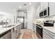 Well-equipped kitchen with modern stainless steel appliances and ample cabinet space at 31675 Cannon Rush Dr, San Antonio, FL 33576