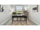 Inviting home office with natural light, modern desk, and stylish decor at 31675 Cannon Rush Dr, San Antonio, FL 33576