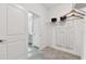 Bright walk-in closet with built-in shelving, hanging rods, and access to the bathroom at 31675 Cannon Rush Dr, San Antonio, FL 33576