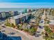Aerial view of a property in close proximity to the beach, residential buildings, and local roads at 40 140Th E Ave, Madeira Beach, FL 33708