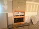 Fireplace being renovated with new cement board and a wood frame at 4004 27Th Se St, Ruskin, FL 33570