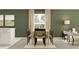 Inviting dining area with wooden table, black chairs, and stylish decor at 4006 Northern Key Dr, Plant City, FL 33563