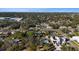 A neighborhood aerial showcasing mature trees, well-kept lawns, and diverse architectural home styles at 4106 W Bay View Ave, Tampa, FL 33611