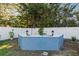 This outdoor built-in barbecue area provides a setting for outdoor gatherings at 4106 W Bay View Ave, Tampa, FL 33611