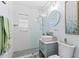 Modern bathroom with a vessel sink, stylish vanity, and a glass-enclosed shower at 4106 W Bay View Ave, Tampa, FL 33611