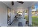 The covered patio offers an outdoor dining area and access to a built-in barbecue at 4106 W Bay View Ave, Tampa, FL 33611