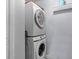 The laundry room features a stacked washer and dryer at 4106 W Bay View Ave, Tampa, FL 33611