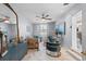 Cozy living room showcasing elegant decor, a ceiling fan, and ample natural light at 4106 W Bay View Ave, Tampa, FL 33611
