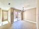 Bright dining room with tile flooring and sliding glass doors to the outdoor patio at 6262 142Nd Ave # 506, Clearwater, FL 33760