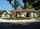 The building is surrounded by palm trees and green landscaping at 6262 142Nd Ave # 506, Clearwater, FL 33760