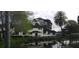 Exterior view of this well kept condo overlooking community pond at 6262 142Nd Ave # 506, Clearwater, FL 33760