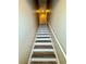 Bright staircase with painted risers and neutral walls at 6262 142Nd Ave # 506, Clearwater, FL 33760
