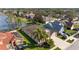 Aerial view of home and property showing proximity to the lake at 7634 Nottinghill Sky Dr, Apollo Beach, FL 33572