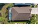 Aerial view of backyard and pool with screen enclosure at 7634 Nottinghill Sky Dr, Apollo Beach, FL 33572