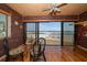 Sun room with brick walls and view of the beach and ocean at 825 S Gulfview Blvd # 208, Clearwater Beach, FL 33767