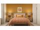 Vibrant bedroom with a comfortable bed, colorful accents, and a welcoming, sun-kissed feel at 9304 Bonita Mar Dr, Parrish, FL 34219