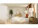 Spacious bedroom with large bed, bedside lamps, stylish decor, and natural lighting at 9304 Bonita Mar Dr, Parrish, FL 34219