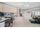 Bedroom includes a seating area, built-in wardrobe, and desk by the window at 9425 Blind Pass Rd # 507, St Pete Beach, FL 33706