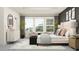 Bright bedroom with ample natural light, plush seating, and modern decor create a relaxing space at 9455 Runaway Breeze Dr, Land O Lakes, FL 34637