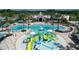Aerial view of Gathering-friendly resort-style water park featuring pools, slides, and play areas at 9455 Runaway Breeze Dr, Land O Lakes, FL 34637