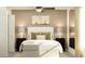 Cozy bedroom with a comfortable bed, decorative pillows, bedside tables with lamps, and a ceiling fan at 9468 Runaway Breeze Dr, Land O Lakes, FL 34637