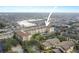 Elevated view of the condo complex surrounded by shopping and trees at 1216 S Missouri Ave # 224, Clearwater, FL 33756