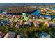 Aerial view of a single-Gathering home in a community with backyard pools and beautiful waterfront views at 10534 Bermuda Isle Dr, Tampa, FL 33647