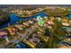 Aerial view of a single-Gathering home in a residential area surrounded by other houses and green trees at 10534 Bermuda Isle Dr, Tampa, FL 33647