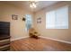 Neutral bedroom featuring wood-look floors, fan and fixtures and natural light at 10534 Bermuda Isle Dr, Tampa, FL 33647
