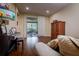 Cozy living room featuring hardwood floors and access to an outdoor patio area at 10534 Bermuda Isle Dr, Tampa, FL 33647