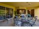 Covered patio with an outdoor grill, sliding doors, and a view of the pool at 10534 Bermuda Isle Dr, Tampa, FL 33647
