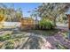 Fenced backyard featuring a wooden deck at 1157 Brook Rd, Clearwater, FL 33755