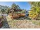 A large backyard with a wooden deck at 1157 Brook Rd, Clearwater, FL 33755