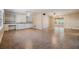 Spacious living area with tile flooring and a sliding glass door leading to an outdoor space at 1157 Brook Rd, Clearwater, FL 33755