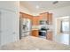 Bright kitchen features stainless steel appliances and light wood cabinets at 13003 Rock Duck Ave, Weeki Wachee, FL 34614