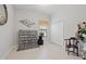 Versatile bonus room featuring tile flooring, a window and ample space for various activities at 13711 Moonstone Canyon Dr, Riverview, FL 33579