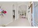 A spacious foyer showcasing arched entrances, tile floors, and stylish decorations at 13711 Moonstone Canyon Dr, Riverview, FL 33579