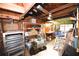 Spacious garage with ample storage, workbench, and various equipment at 1372 Palmetto St, Clearwater, FL 33755