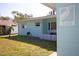 Street view of the home's exterior and front yard featuring exterior paint and yard at 140 89Th Ne Ave, St Petersburg, FL 33702