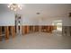 Bright and airy living room with terrazzo flooring, exposed walls, and great natural light at 140 89Th Ne Ave, St Petersburg, FL 33702