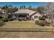 Spacious backyard with a screened-in pool, ideal for enjoying the outdoors at 16331 Burniston Dr, Tampa, FL 33647
